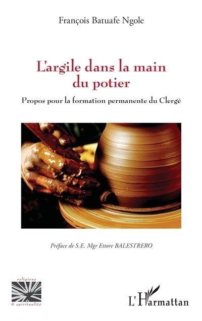 argile dans la main du potier (L')